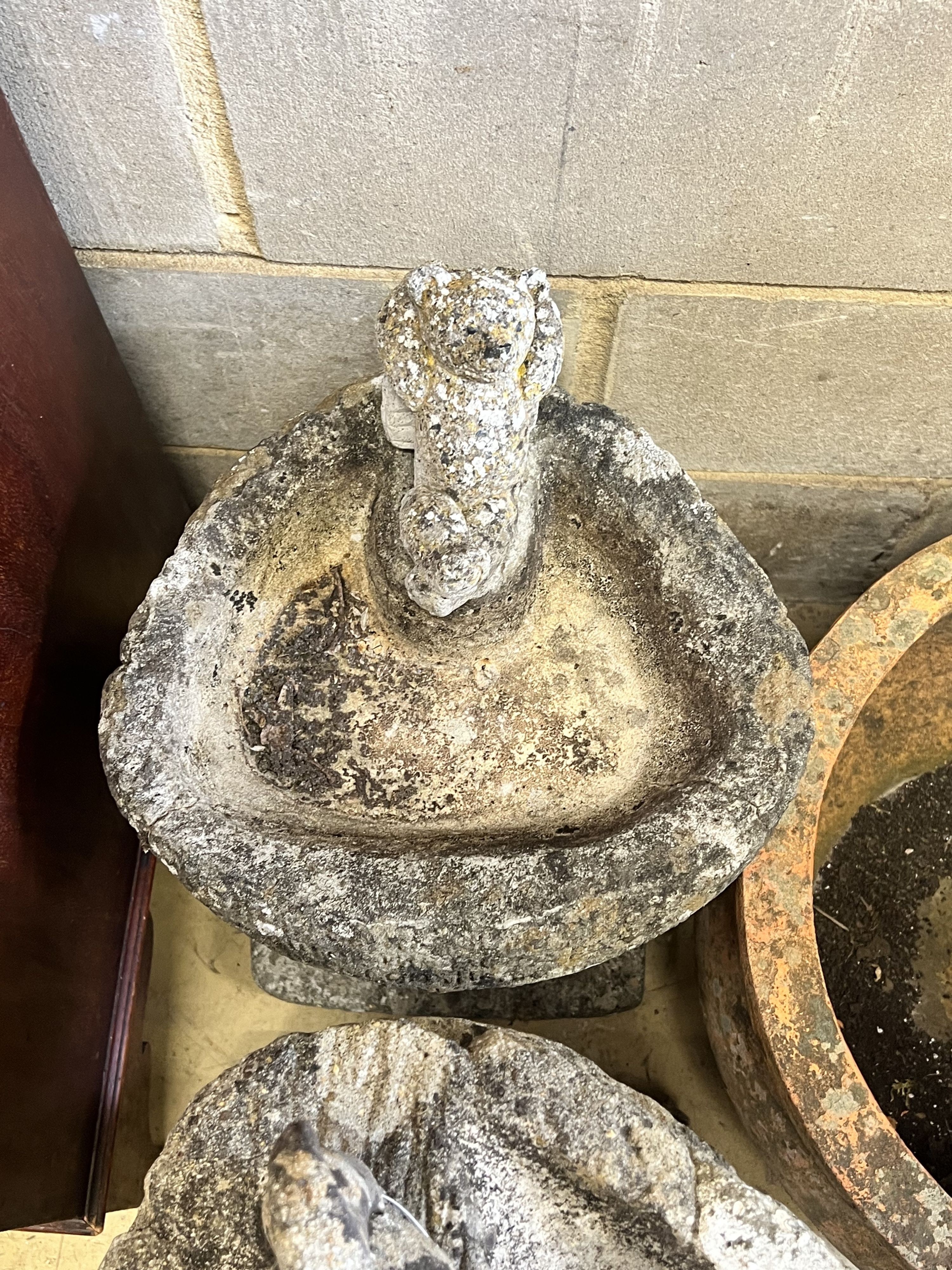 Two reconstituted stone garden bird baths, tallest 66cm